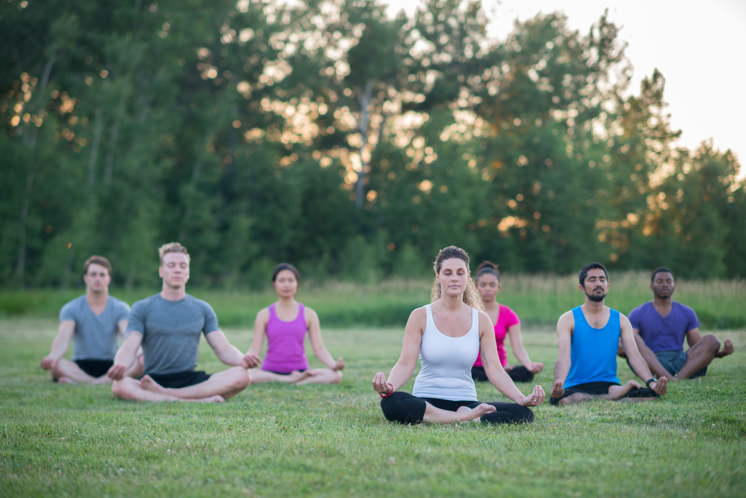 Meditating in an Outdoor Yoga Class